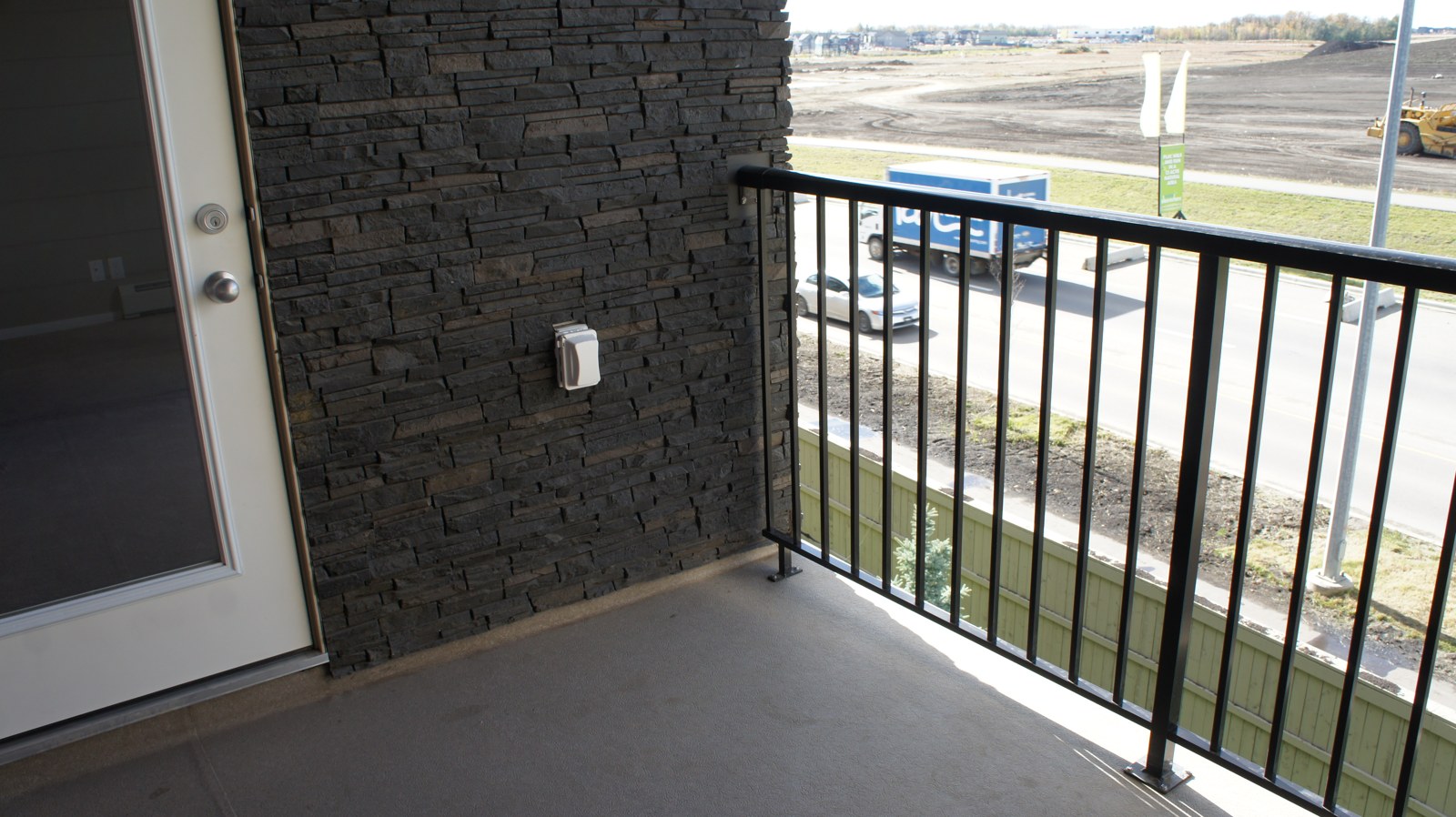 Balcony with stone accent wall