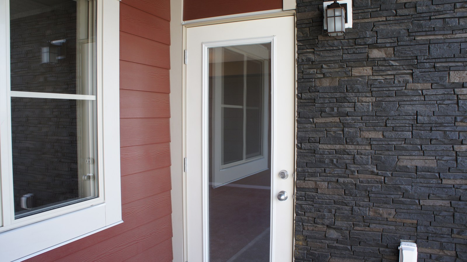 Exterior entry with stone
